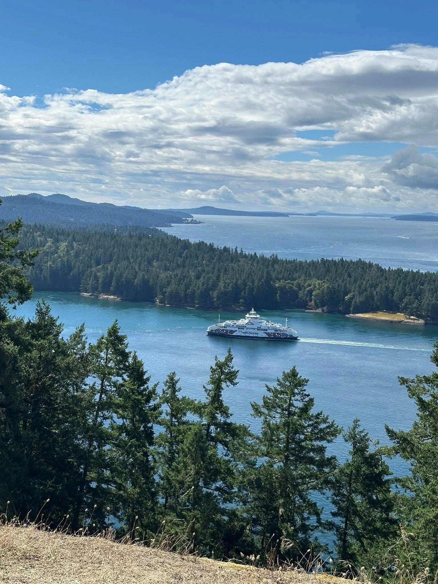 Ferry sailing on the water between the islands